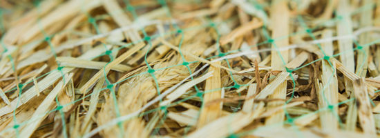 Agricultural straw secured with polypropylene