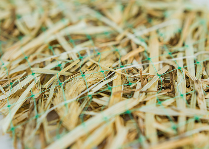 Agricultural straw secured with polypropylene
