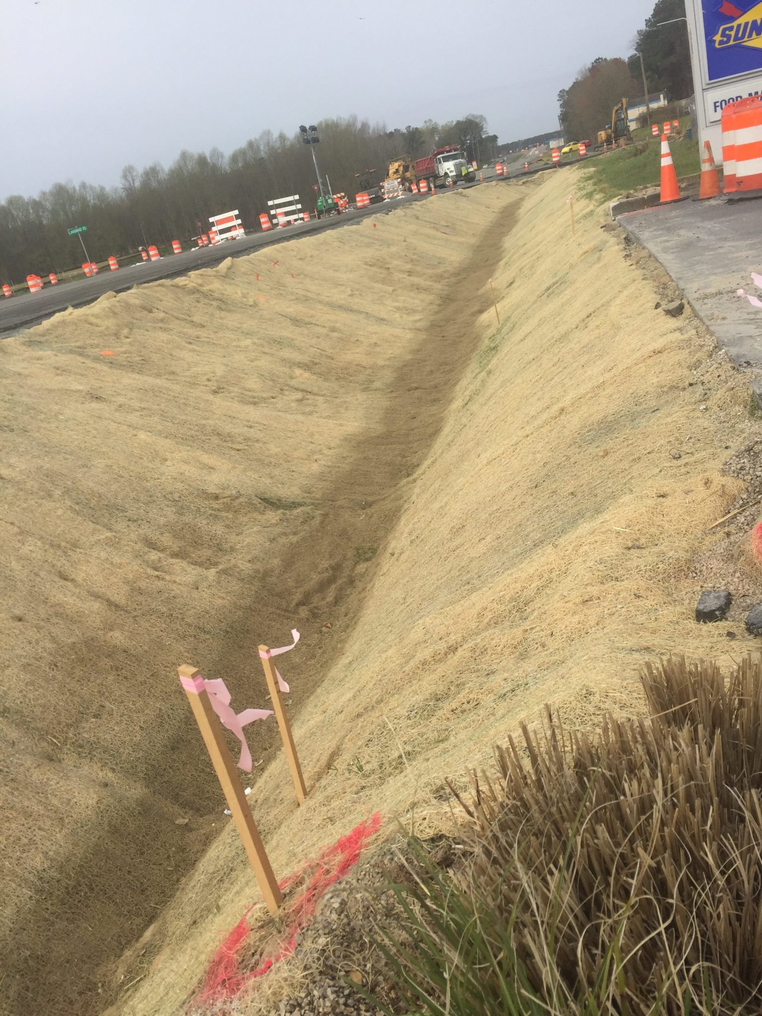 Erosion control blankets being used along a highway