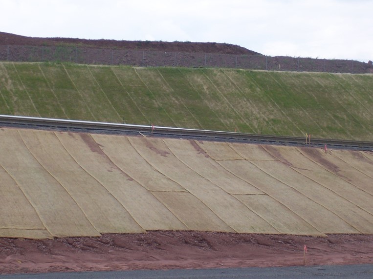 Erosion control blankets being used on slopes